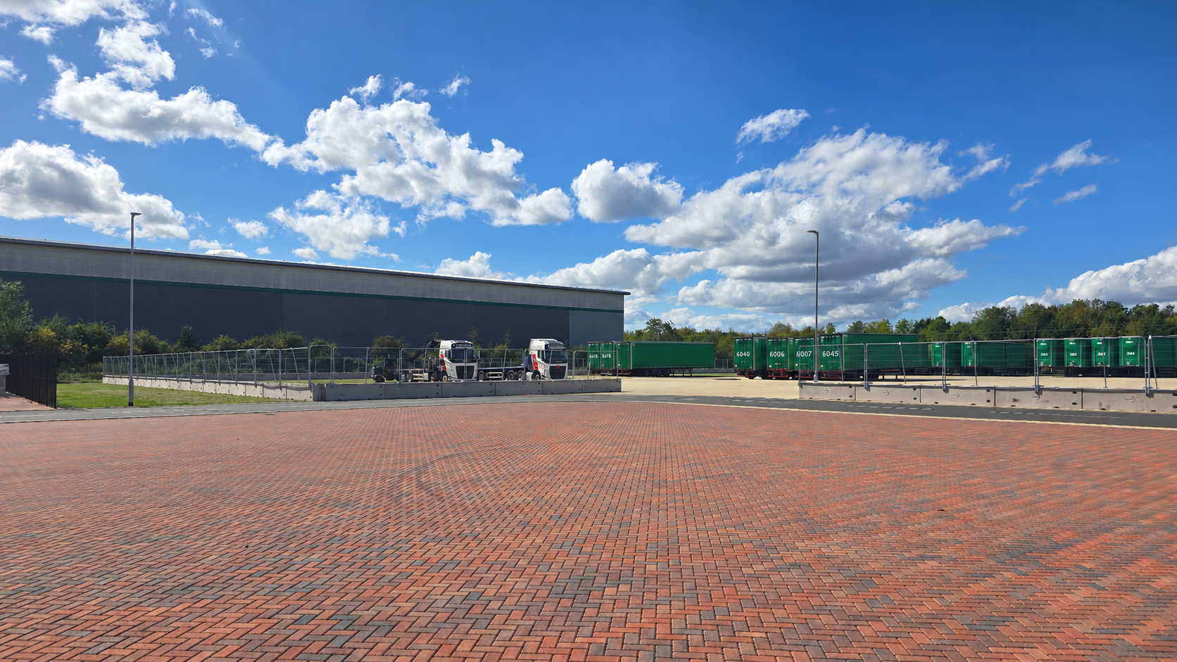 Completed barriers and fencing around the new commercial yard