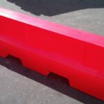 Close up image of a plastic EVO Road Barrier from Maltaward