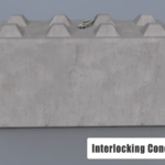 Large interlocking concrete block with a lizard on top and labelled “Interlocking Concrete Block”.