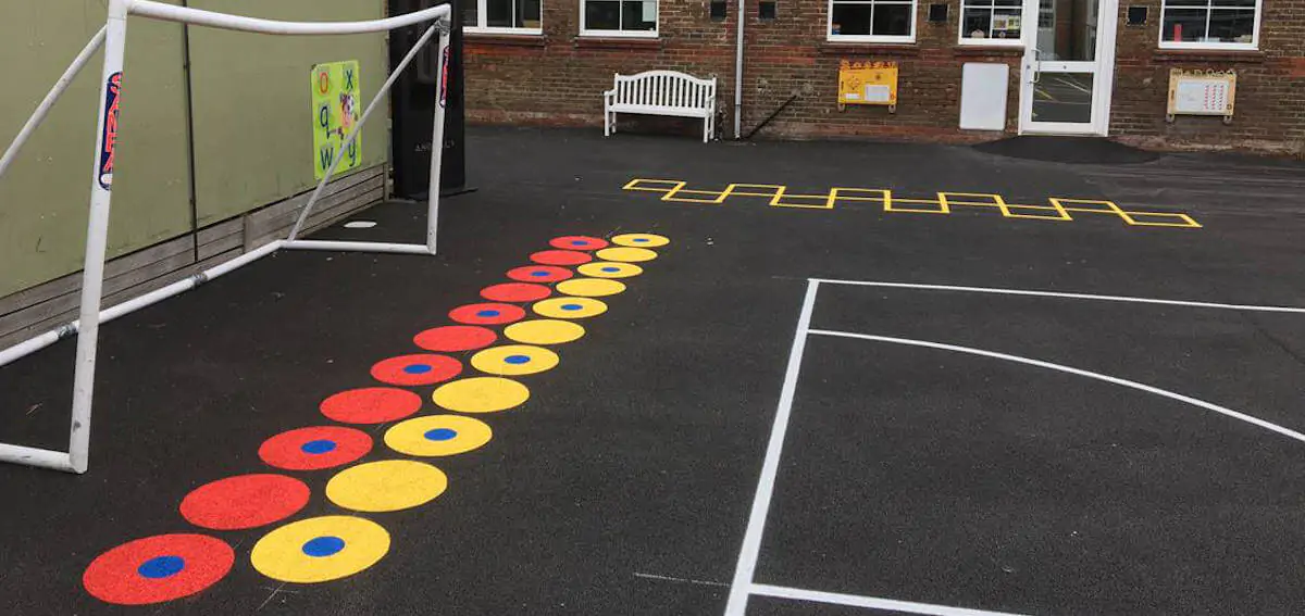Playground painted lines for tarmac football pitch